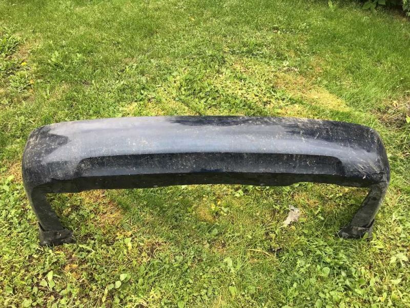 Rear bumper cover used genuine OEM Nissan Sentra 2004-2006
