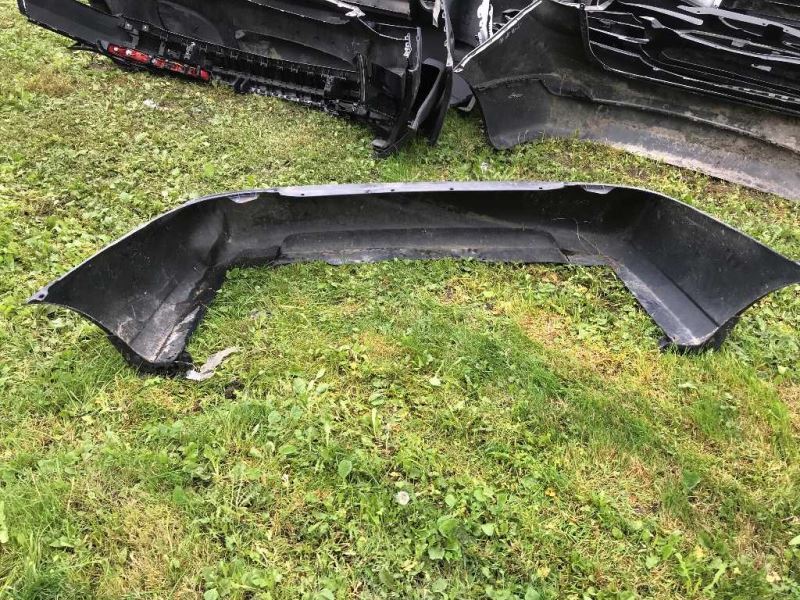 Rear bumper cover used genuine OEM Nissan Sentra 2004-2006