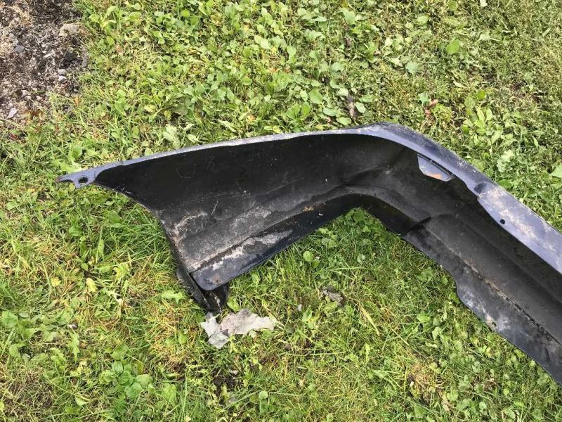 Rear bumper cover used genuine OEM Nissan Sentra 2004-2006