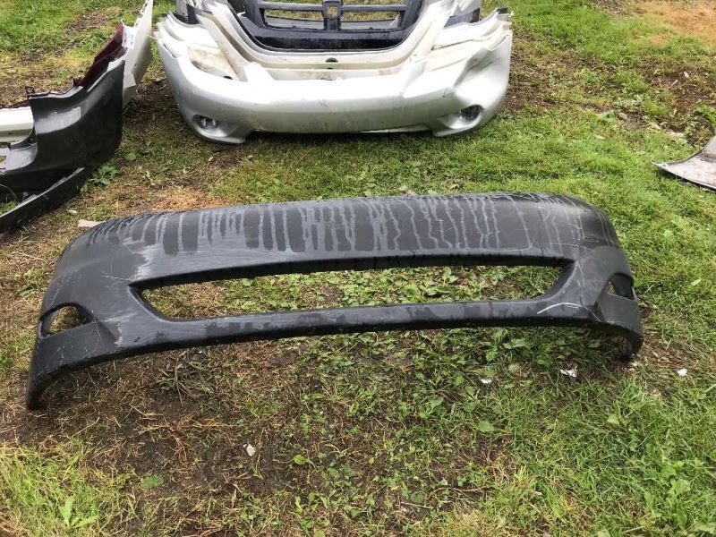 Front bumper cover used genuine OEM Toyota Sienna 2006-2010