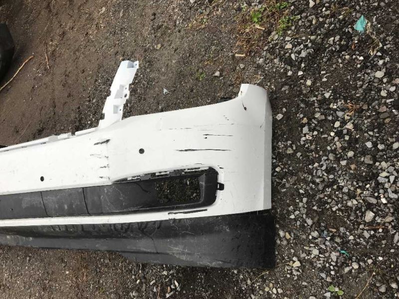 Front bumper cover used genuine OEM Chevrolet Suburban 2015-2020