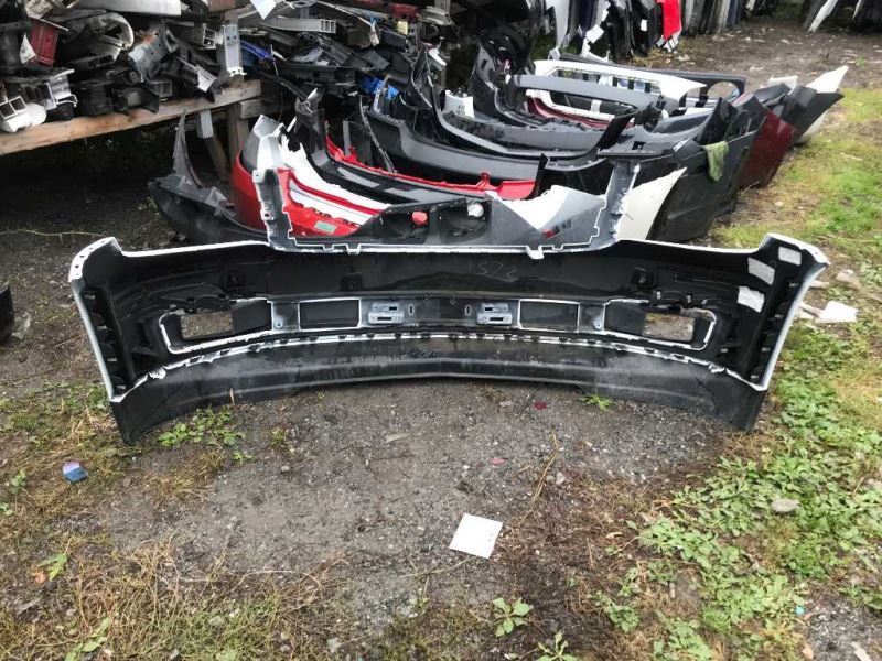 Front bumper cover used genuine OEM Chevrolet Suburban 2015-2020