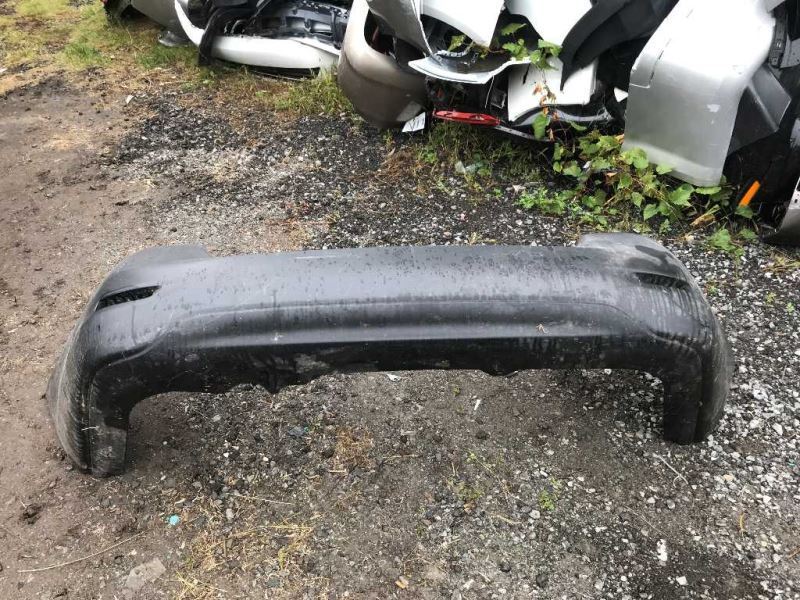 Rear bumper cover used genuine OEM Nissan Sentra 2013-2015