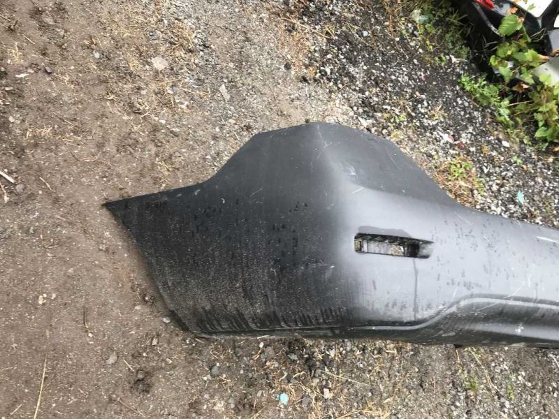 Rear bumper cover used genuine OEM Nissan Sentra 2013-2015
