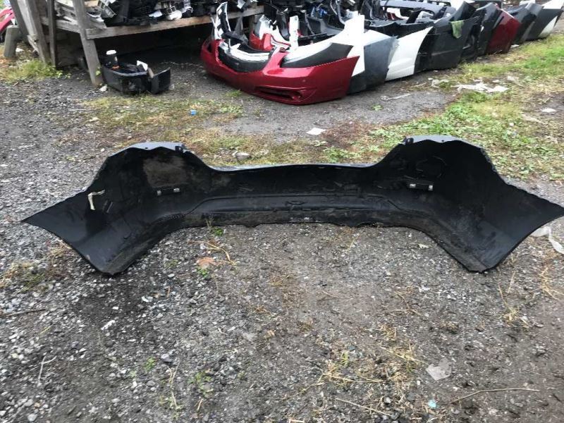 Rear bumper cover used genuine OEM Nissan Sentra 2013-2015