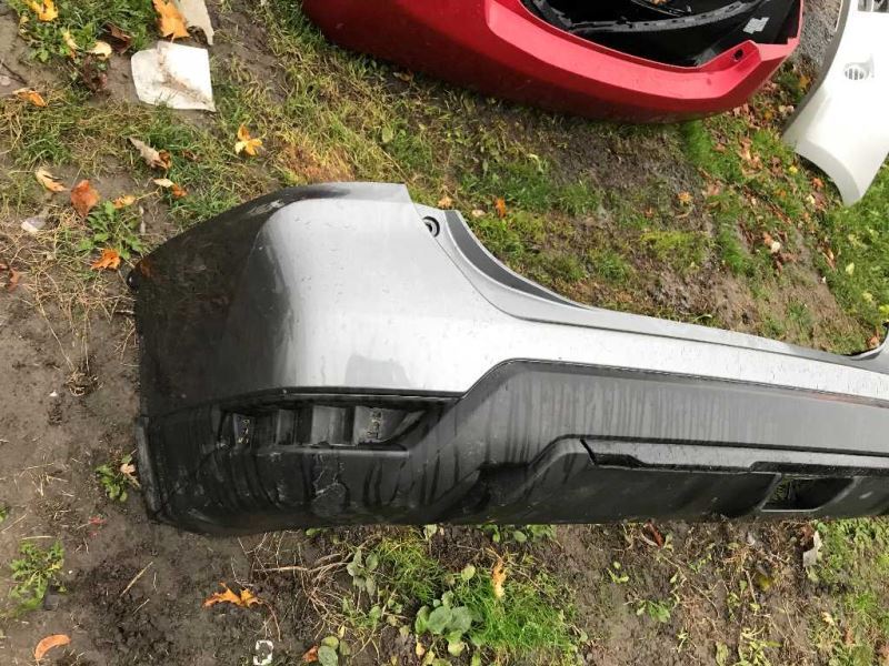 Rear bumper cover used genuine OEM Nissan Rogue 2017-2020