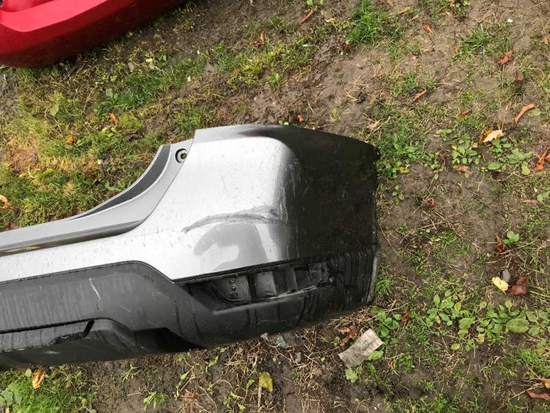 Rear bumper cover used genuine OEM Nissan Rogue 2017-2020