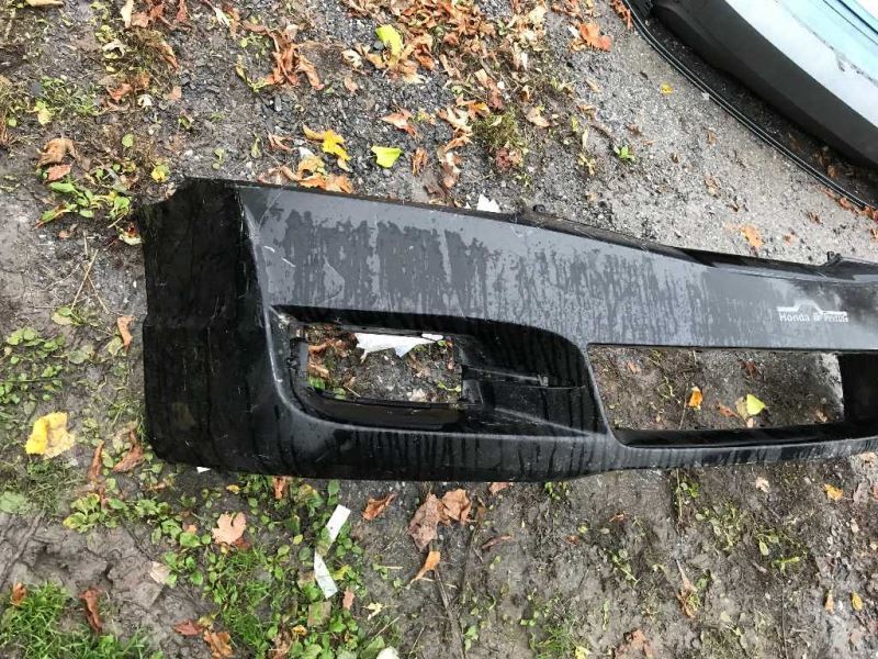 Front bumper cover used genuine OEM Honda Civic 2009-2011