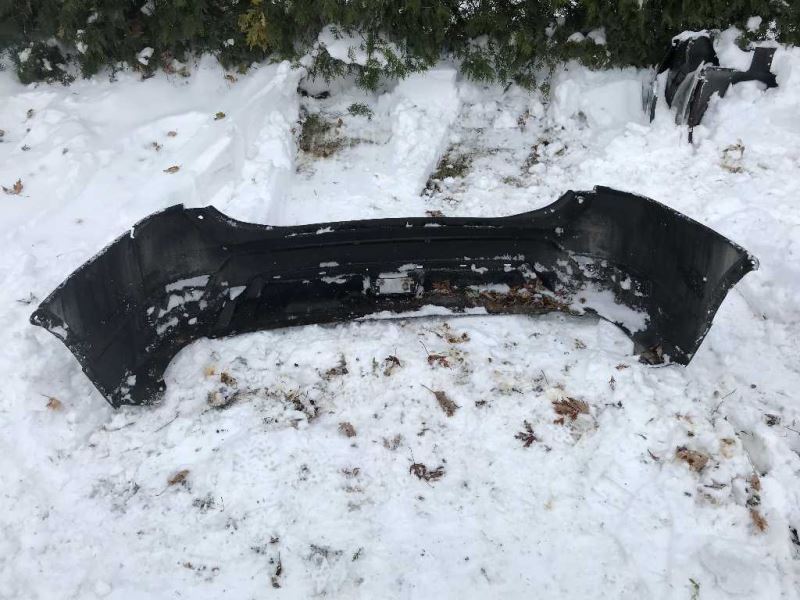 Rear bumper cover used genuine OEM Nissan Rogue 2017-2020