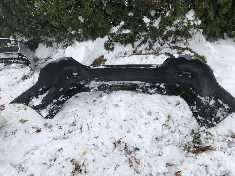 Rear bumper cover used genuine OEM Nissan Sentra 2013-2015