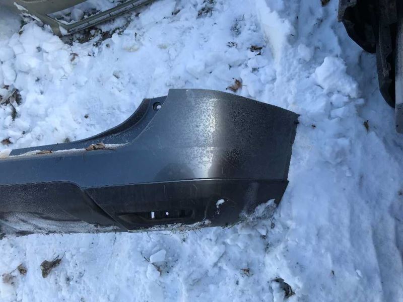 Defensa (parachoques) trasera usada original (OEM) Nissan Rogue 2014-2016