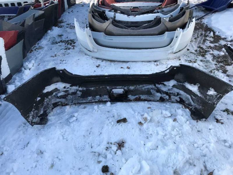 Defensa (parachoques) trasera usada original (OEM) Nissan Rogue 2014-2016