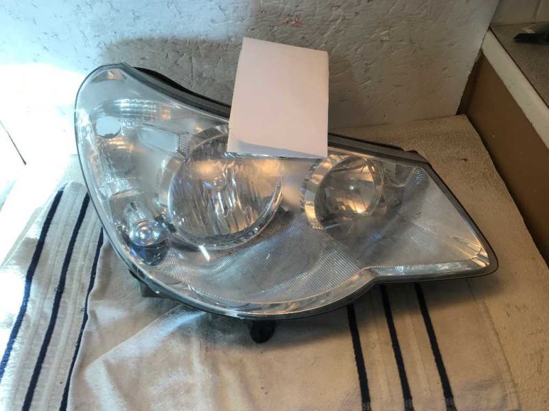 Right headlamp lens/housing used genuine OEM Volkswagen Routan 2009-2012