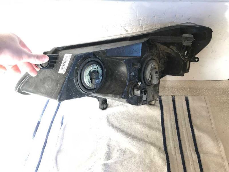 Right headlamp lens/housing used genuine OEM Volkswagen Routan 2009-2012