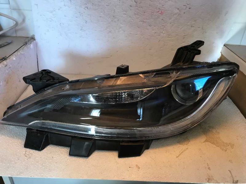 Faro izquierdo usado original (OEM) Chrysler 200 2015