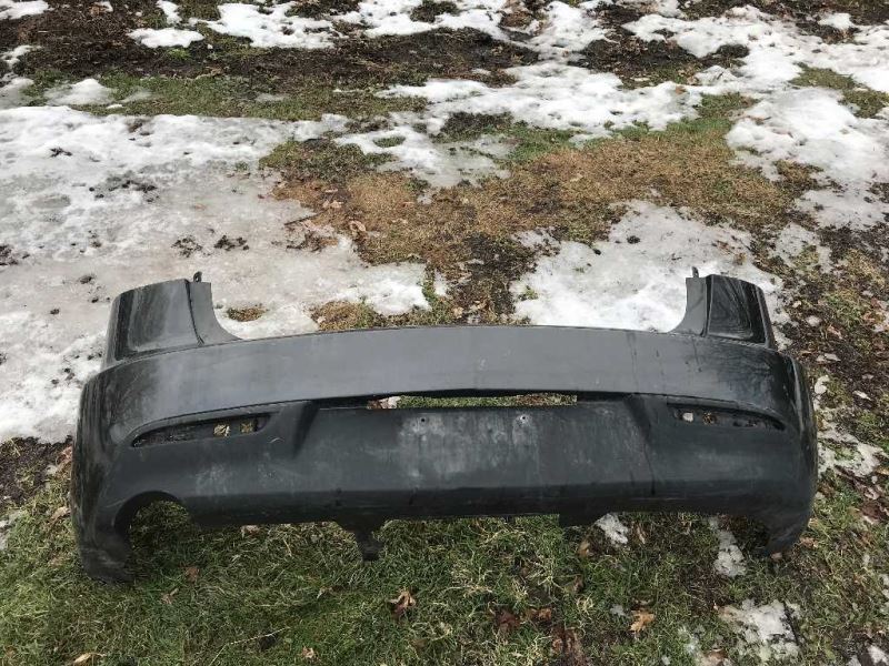 Rear bumper cover used genuine OEM Mazda 3 2010-2011