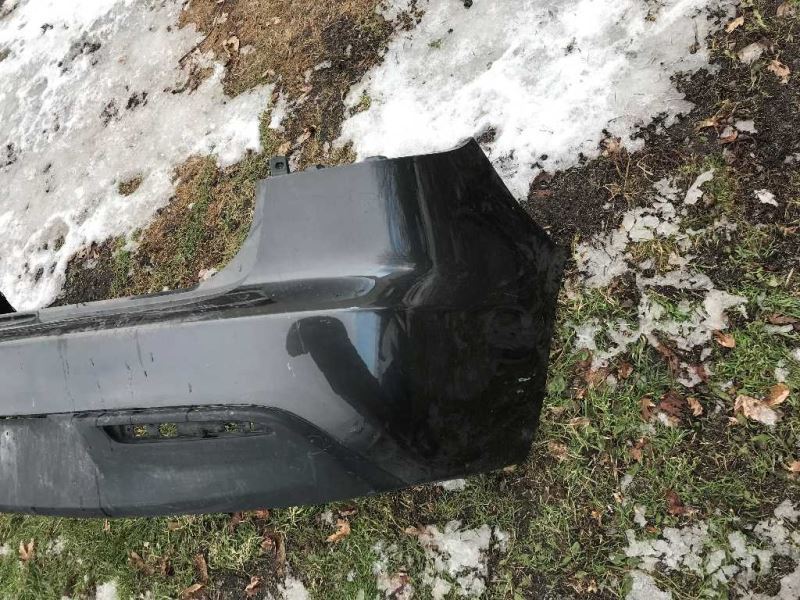 Rear bumper cover used genuine OEM Mazda 3 2010-2011