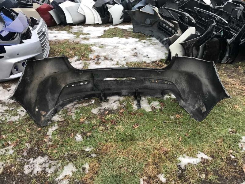 Rear bumper cover used genuine OEM Mazda 3 2010-2011