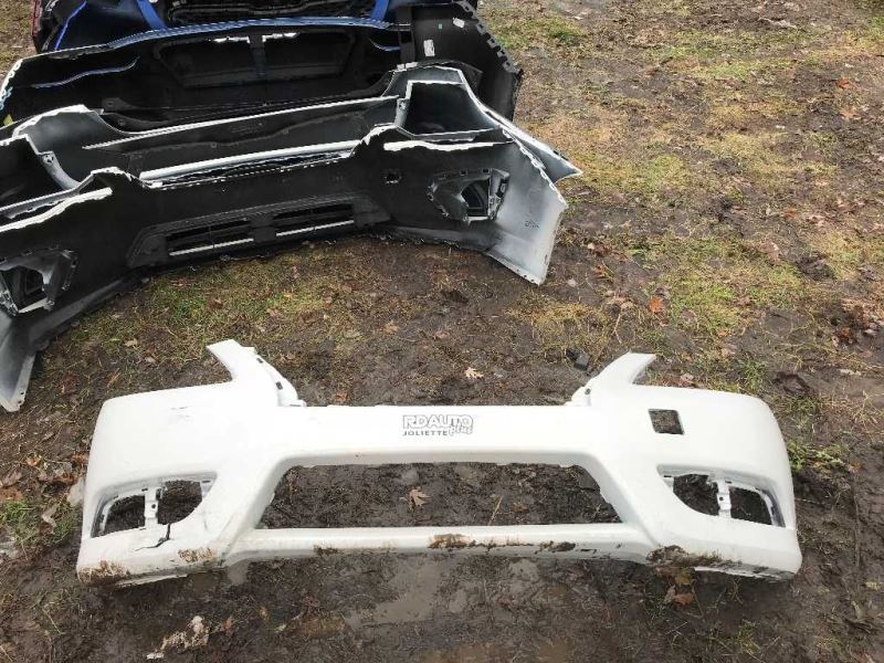Front bumper cover used genuine OEM Nissan Sentra 2013-2015
