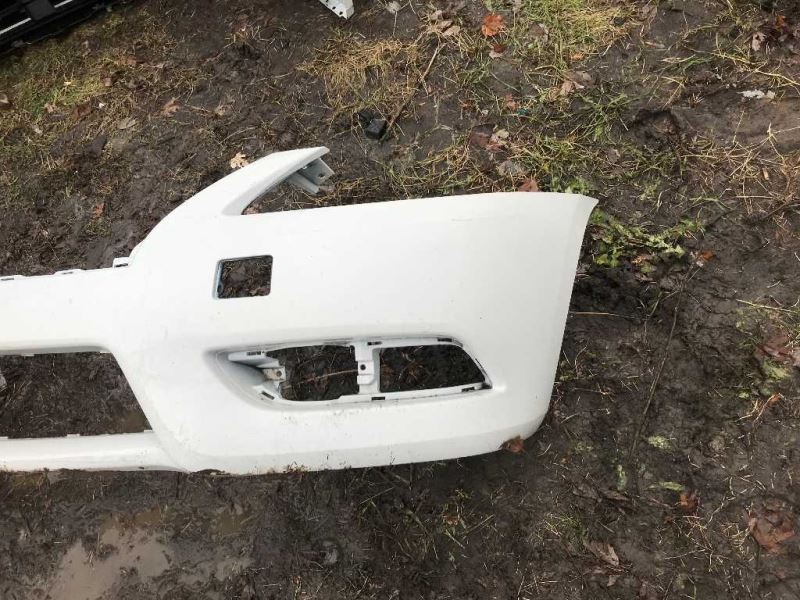 Front bumper cover used genuine OEM Nissan Sentra 2013-2015