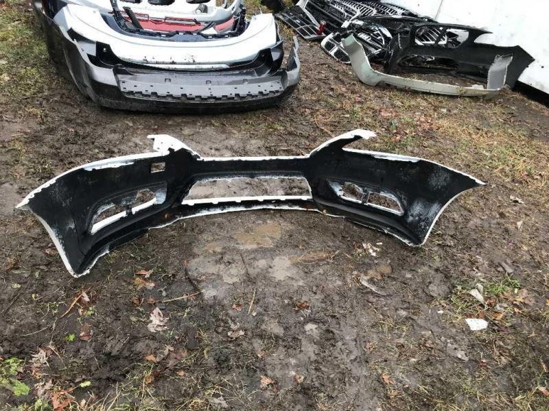 Front bumper cover used genuine OEM Nissan Sentra 2013-2015