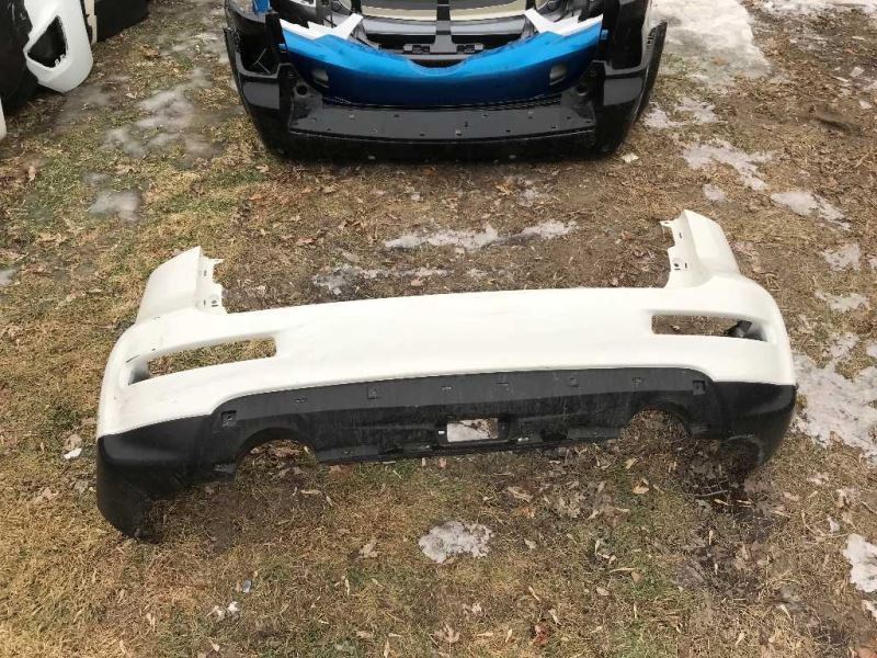Rear bumper cover used genuine OEM Infiniti QX50 2016-2017