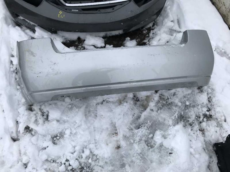 Rear bumper cover used genuine OEM Nissan Sentra 2007-2012