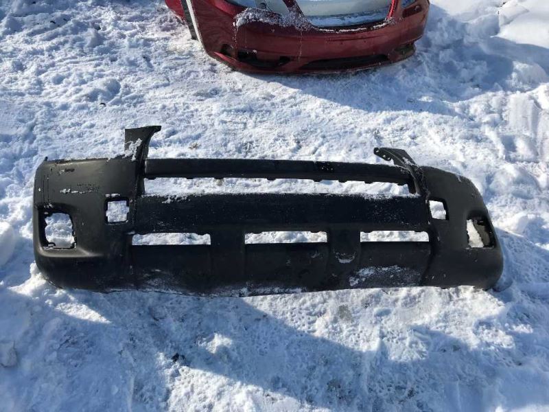 Front bumper cover used genuine OEM Toyota RAV4 2009-2012