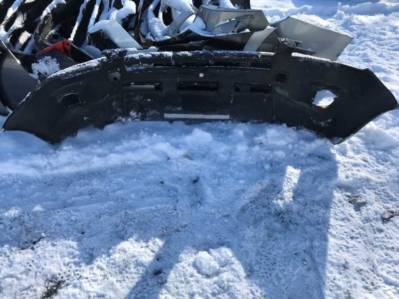 Front bumper cover used genuine OEM Toyota RAV4 2009-2012