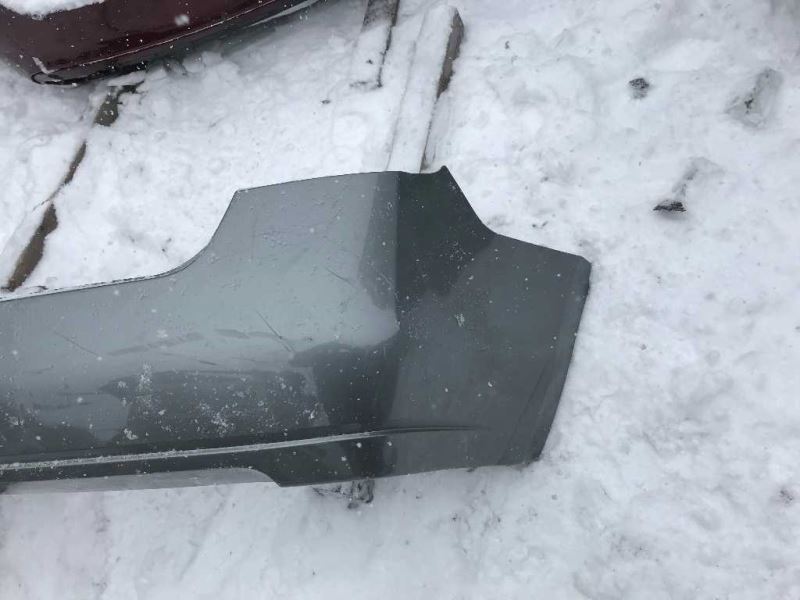 Rear bumper cover used genuine OEM Nissan Sentra 2007-2012