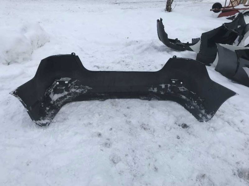 Rear bumper cover used genuine OEM Nissan Sentra 2013-2015