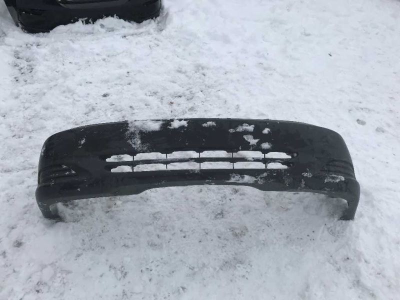 Front bumper cover used genuine OEM Toyota Camry 2002-2004
