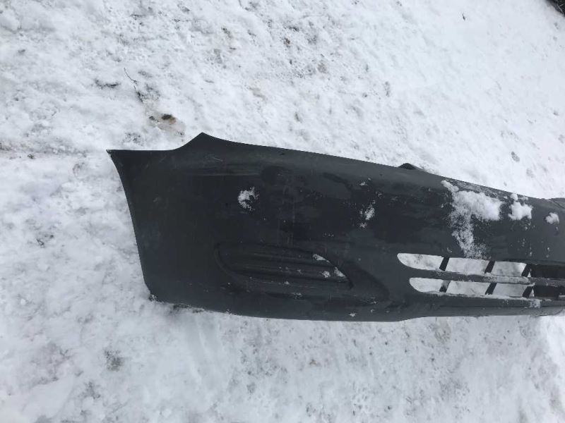 Front bumper cover used genuine OEM Toyota Camry 2002-2004