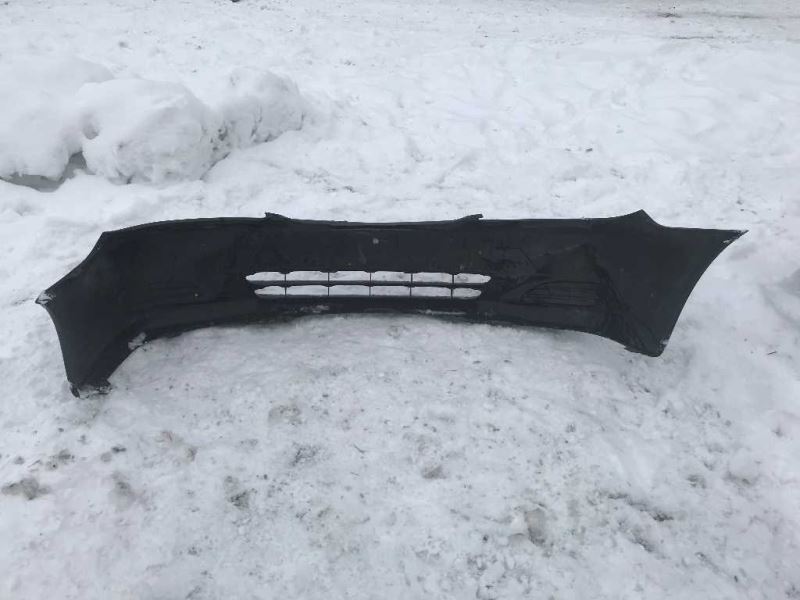 Front bumper cover used genuine OEM Toyota Camry 2002-2004