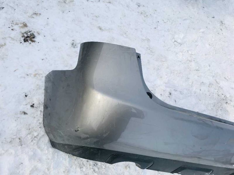 Rear bumper cover used genuine OEM Nissan Rogue 2008-2013