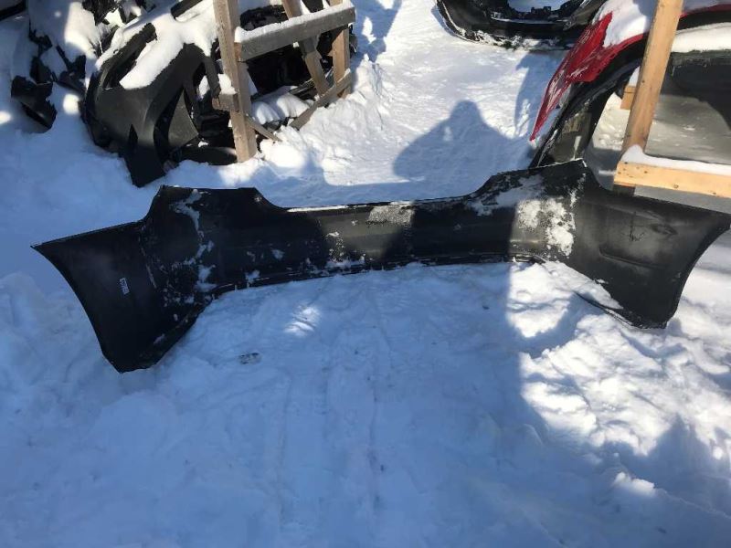 Rear bumper cover used genuine OEM Toyota Camry 2015-2017