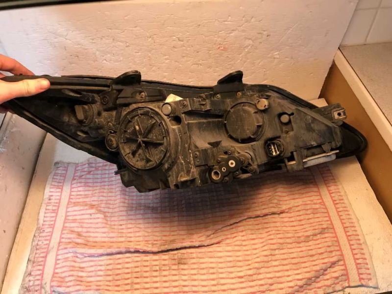 Faro izquierdo usado original (OEM) Hyundai Genesis 2009-2011