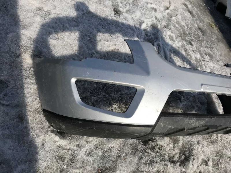 Front bumper cover used genuine OEM KIA Sportage 2009-2010