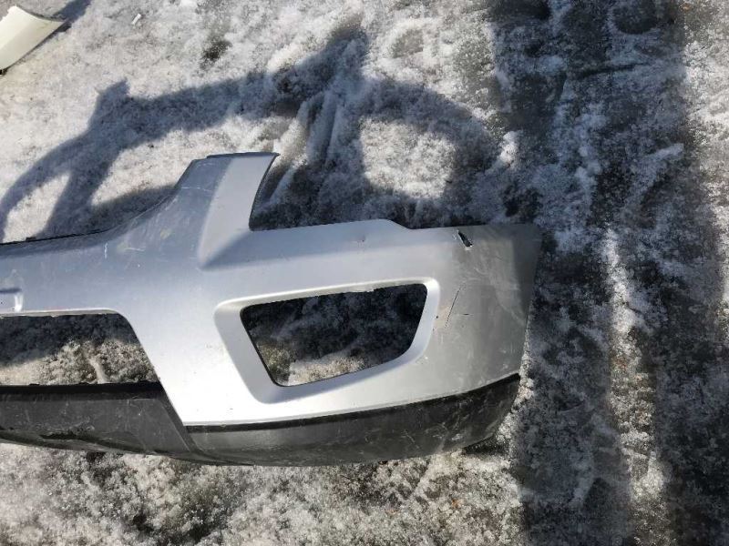 Front bumper cover used genuine OEM KIA Sportage 2009-2010