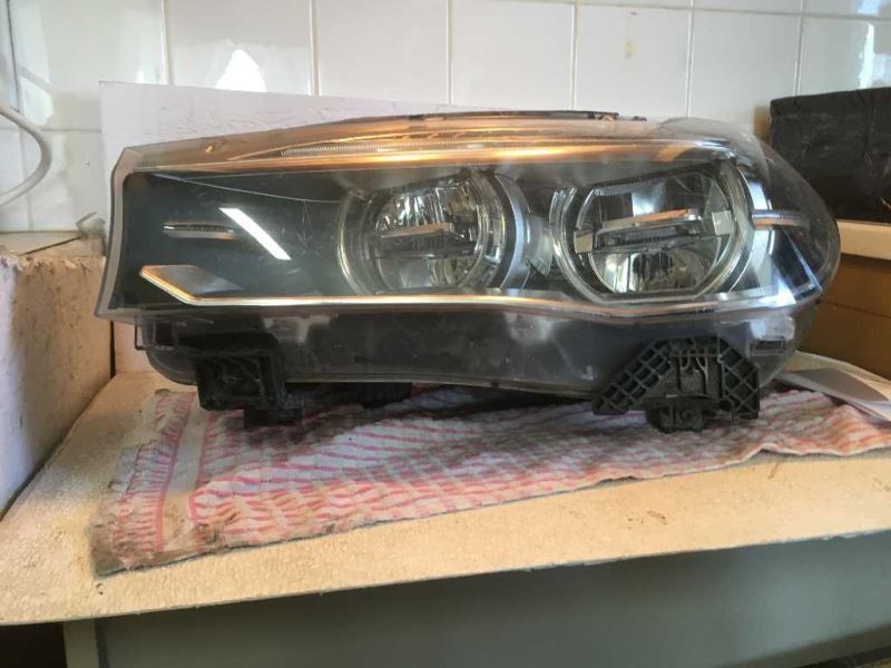 Left headlamp lens/housing used genuine OEM BMW X6 2015-2019