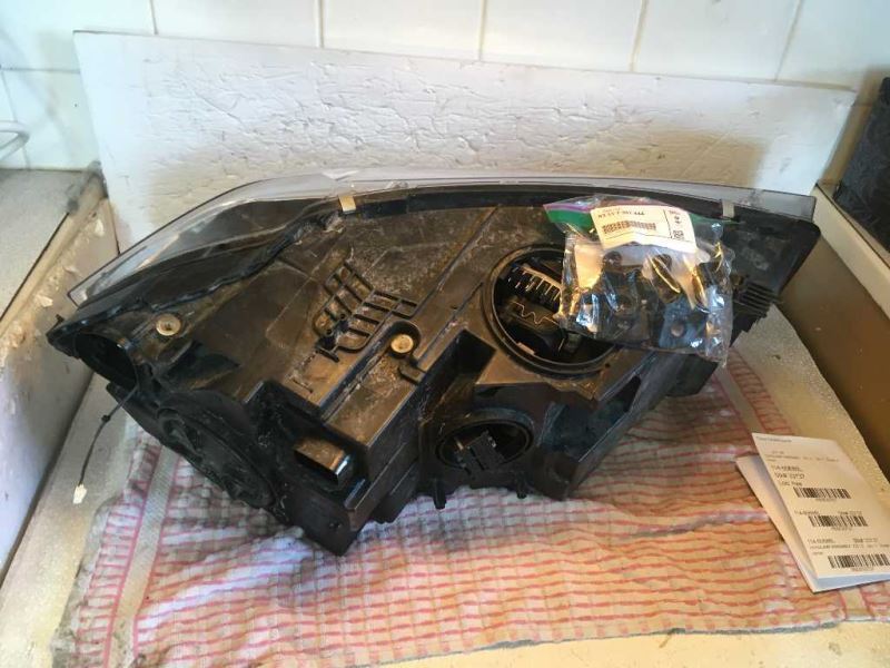 Left headlamp lens/housing used genuine OEM BMW X6 2015-2019