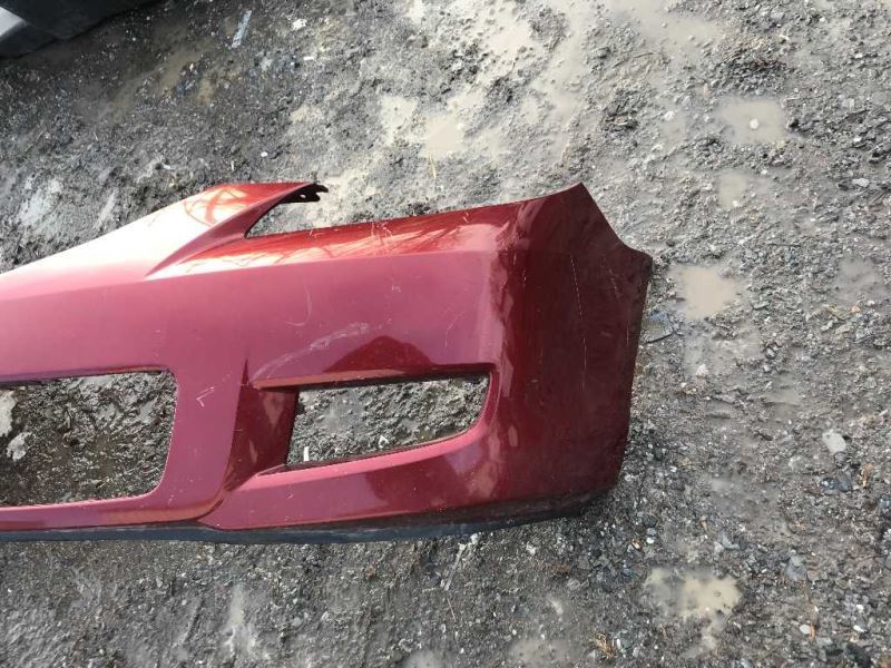 Front bumper cover used genuine OEM Mazda 3 2007-2009