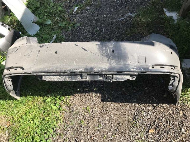 Rear bumper cover used genuine OEM BMW 750I 2011-2012