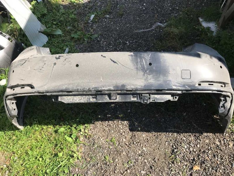 Rear bumper cover used genuine OEM BMW 750I 2011-2012