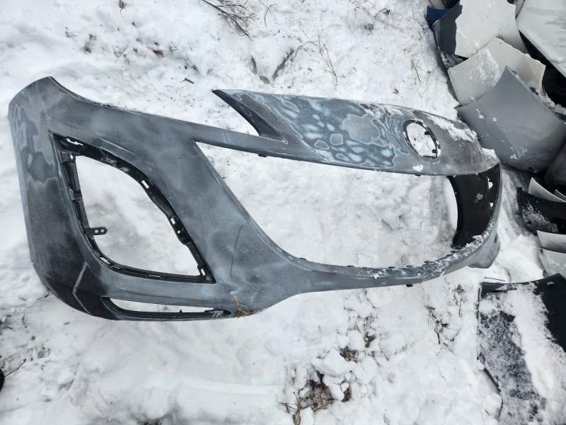 Front bumper cover used genuine OEM Mazda 3 2010-2011