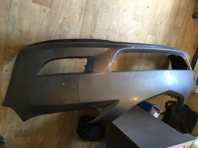 Front bumper cover used genuine OEM Mazda 3 2004-2006