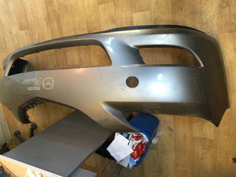Front bumper cover used genuine OEM Mazda 3 2004-2006