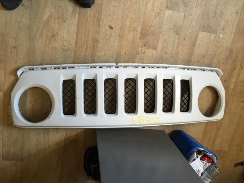 Grille molding used genuine OEM Jeep Patriot 2011-2017