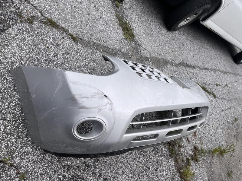 Front Bumper Cover used genuine OEM Nissan Rogue 2008-2010