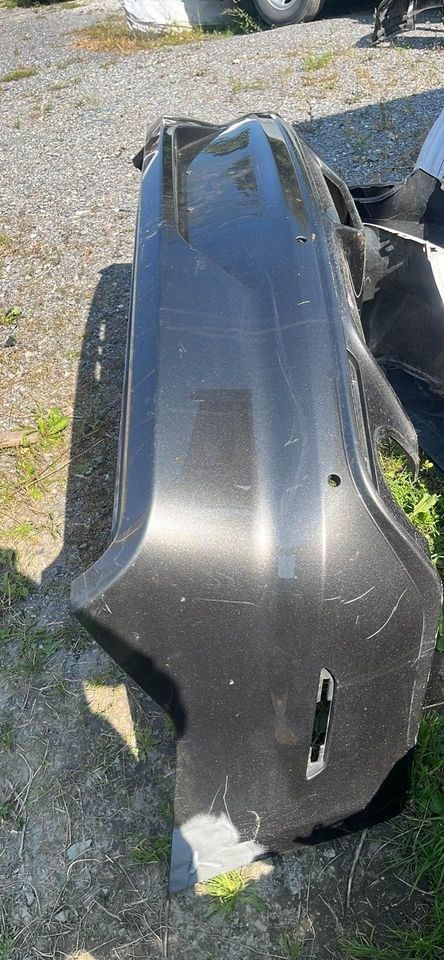 Defensa (parachoques) trasera usada original (OEM) Ford Mustang 2018-2023